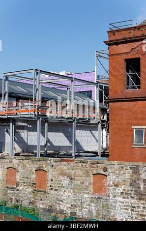 Radcliffe, sito di costruzione di collegamenti con hub civico, con telaio in acciaio a scheletro, a Greater manchester, regno unito Foto Stock