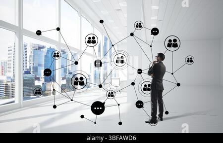 Imprenditore elegante in 3D Interni Ufficio e sociale il concetto di connessione. I supporti misti Foto Stock