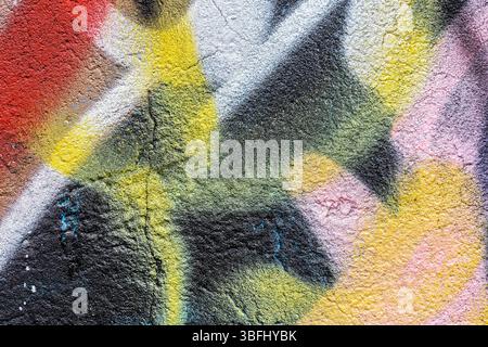 graffiti colorati per street art su sfondo in stucco. frammento. vista ravvicinata dettagliata. Foto Stock