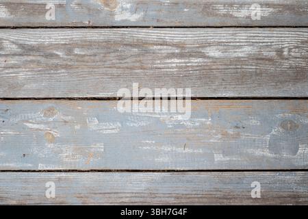 Sfondo in legno. L'immagine mostra uno sfondo fatto di una vecchia tavola di legno incrinata, che sembra molto espressivo e autentico. Foto Stock