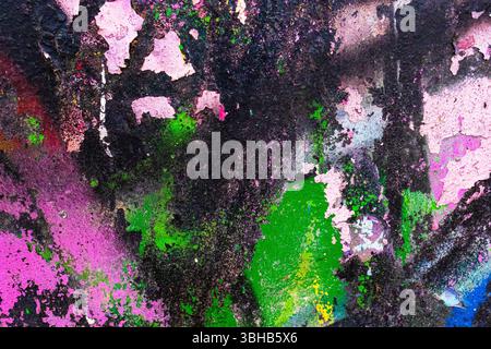 Vibrante spruzzo di vernice Grunge in rosa, verde, nero per lo stile graffiti anni '90 Foto Stock