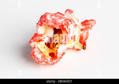 Sfondo colorato di popcorn caramelle. Sfondo luminoso Foto Stock