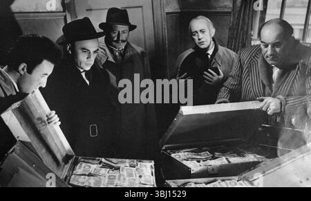 Gli attori britannici Alec Guinness, Peter Sellers, Cecil Parker e Danny Green nel film The Ladykillers, Regno Unito 1955 Foto Stock