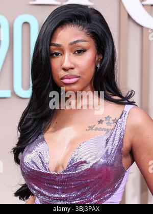 LOS ANGELES, CALIFORNIA, USA - 09 GIUGNO: Il rapper americano Yung Miami (Caresha Romeka Brownlee) arriva ai BET Awards 2025 (25th Annual BET Awards) che si tengono al Peacock Theater al L.A. Live il 9 giugno 2025 a Los Angeles, California, Stati Uniti. (Foto di Xavier Collin/Image Press Agency) Foto Stock