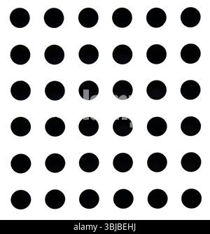 Motivo geometrico astratto con molti piccoli cerchi neri disposti in modo ordinato su una superficie di fondo bianca. Foto Stock
