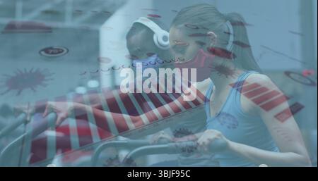 Esercizio fisico donna e uomo che indossano abbigliamento sportivo e maschere su ellittiche in palestra con sovrapposizione di dati virus Foto Stock