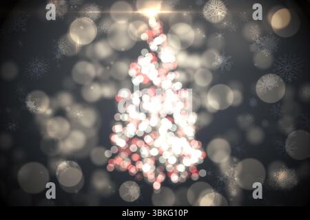Scintillante albero di natale di luci Foto Stock