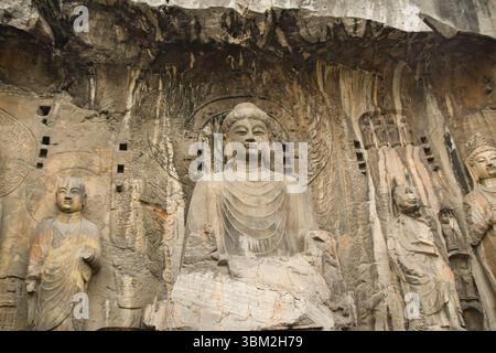 Statue buddiste alle Grotte di Longmen a Luoyang Foto Stock