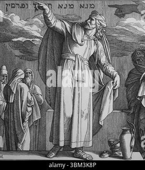 Vecchio Testamento. Daniel legge la frase sul muro al re di Babilonia illustrazione di J. Schnorr von Carolsfeld. "La Bibbia dei quadri", 1852-60. Foto Stock