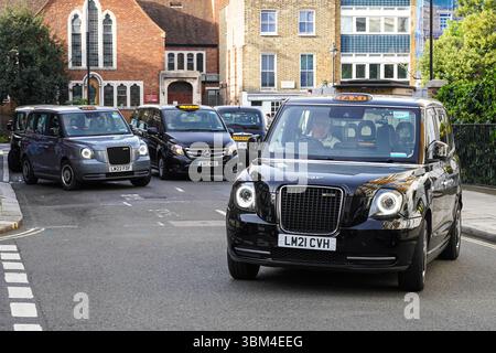 Nuovo taxi elettrico black Cab a Londra Inghilterra Regno Unito Regno Unito Foto Stock