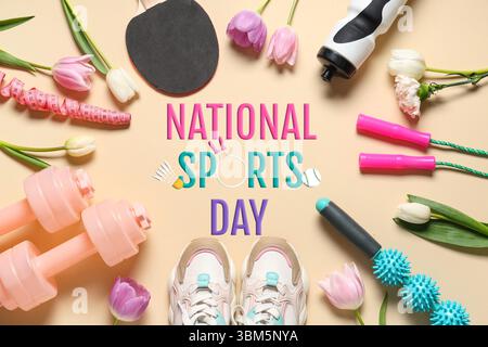 Diverse attrezzature sportive e fiori sullo sfondo beige. Giornata nazionale dello sport Foto Stock