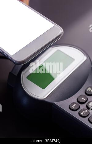 Smartphone e lettore di schede Foto Stock