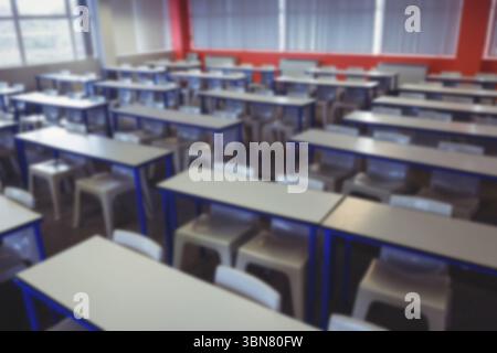 Immagine sfocata di sedie e scrivania Foto Stock