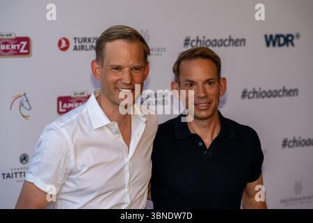 Aquisgrana, Germania. 1 luglio 2025. Hendrik Streeck (Politiker und Virologe) und Sein Mann Paul Zubeil Media Night im Rahmen des CHIO Aachen 2025, Reitsport, CHIO Aachen, 2025, 01.07.2025 foto: Eibner-Pressefoto/J. Derondeau Credit: dpa/Alamy Live News Foto Stock