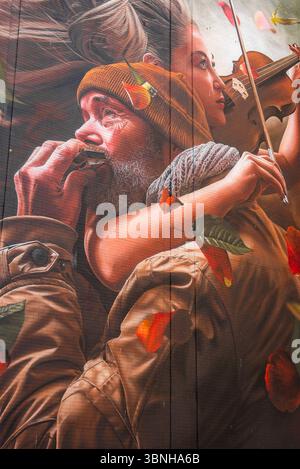 Murale di uomo con armonia e donna con violino a Utrecht Foto Stock
