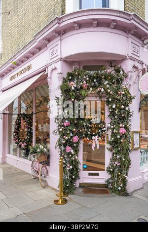 Decorazioni natalizie sul caffè rosa Peggy Porschen a Londra Inghilterra Regno Unito Foto Stock