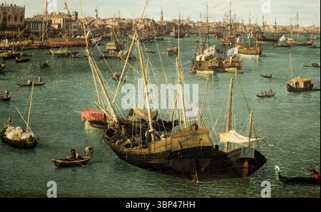 Bacino di San Marco, Venezia di Antonio Canaletto (1697-1768). Questo dipinto è un classico esempio di vedutismo veneziano, o "pittura di vista", per il quale Canaletto è rinomato. Le sue dettagliate e spesso drammatiche rappresentazioni del Canal grande di Venezia e dei suoi vari bacini furono molto ricercate dai grandi turisti, offrendo un ritratto idealizzato ma accurato della vita marittima e dello splendore architettonico della città. c. 1738. Foto Stock