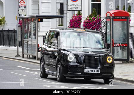 Nuovo taxi elettrico black Cab a Londra Inghilterra Regno Unito Regno Unito Foto Stock
