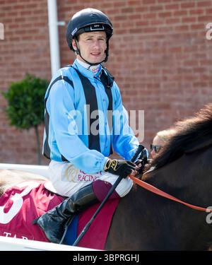 Incontro del Qatar Goodwood Festival 2024 all'ippodromo di Goodwood, Chichester - Jockey Oisin Murphy Foto Stock