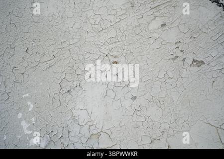 Grana di vernice bianca incrinata dettagliata Foto Stock
