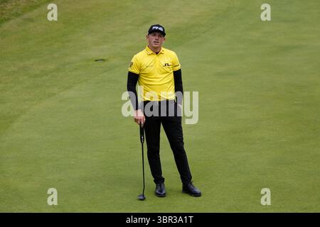 Matt Wallace in azione il 3° giorno il 148° Open Championship 2019 si è svolto dal 18 al 21 luglio 2019 al Royal Portrush Golf Club nella contea di Antrim, Irlanda del Nord. Questo segnò il ritorno del torneo in Irlanda del Nord per la prima volta dal 1951. L'evento è stato notevole non solo per la vittoria di Lowry, ma anche per l'entusiasta sostegno della folla locale, celebrando il successo di un campione locale sul suolo irlandese. Foto Stock