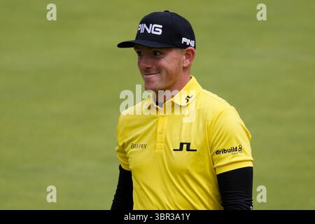 Matt Wallace in azione il 3° giorno il 148° Open Championship 2019 si è svolto dal 18 al 21 luglio 2019 al Royal Portrush Golf Club nella contea di Antrim, Irlanda del Nord. Questo segnò il ritorno del torneo in Irlanda del Nord per la prima volta dal 1951. L'evento è stato notevole non solo per la vittoria di Lowry, ma anche per l'entusiasta sostegno della folla locale, celebrando il successo di un campione locale sul suolo irlandese. Foto Stock
