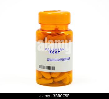 Pillole valeriane. Tradizionalmente utilizzato per ridurre l'insonnia e promuovere il rilassamento. Foto Stock
