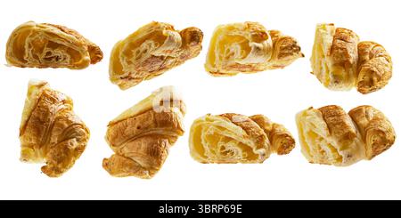 Vista ravvicinata di una serie di croissant appena sfornati in vari tipi di angoli isolati su uno sfondo bianco Foto Stock