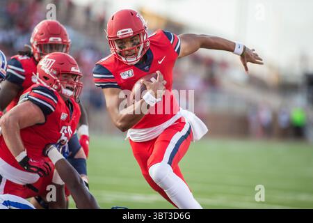 21 settembre 2019: Il quarterback dei Liberty Flames Brandon Robinson (4) si precipita nella end zone durante un'azione di football NCAA tra gli Hampton Pirates e i Liberty Flames al Williams Stadium di Lynchburg, Virginia. Jonathan Huff/CSM.(immagine di credito: &Copy; Jonathan Huff/CSM tramite cavo ZUMA) Foto Stock