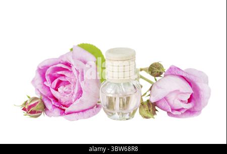 Fiala con olio essenziale e due rose isolate su sfondo bianco Foto Stock
