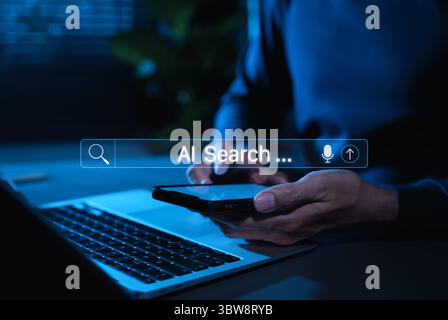 Concetto di tecnologia dei motori di ricerca AI. Uomo che usa uno smartphone con un'interfaccia della barra di ricerca IA che rappresenta la tecnologia di ricerca dell'intelligenza artificiale, Foto Stock