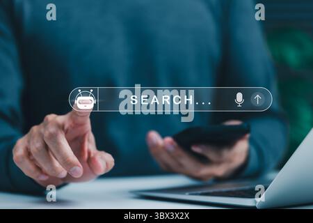 Concetto di tecnologia per i motori di ricerca chatbot AI. Persona che utilizza la barra di ricerca con icona chatbot ai, motori di ricerca intelligenti, assistenti digitali e modernità Foto Stock