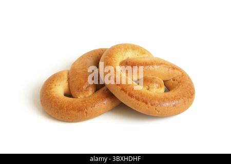 Nodo-biscotti di forma su sfondo bianco Foto Stock