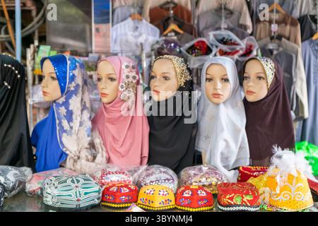 Quartiere musulmano di XI'an, che propone cucina locale, architettura e vita di strada quotidiana in Cina. Foto Stock