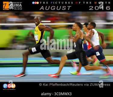 14 agosto 2016 - Rio de Janeiro, RJ, Brasile - USAIN BOLT della Giamaica (L) sorride sulla strada per vincere le semifinali maschili di 100 m allo Stadio Olimpico durante le Olimpiadi di Rio 2016. (Immagine di credito: © Kai Pfaffenbach/Reuters via ZUMA Press) Foto Stock