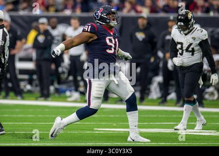 30 dicembre 2018: Il defensive end degli Houston Texans Carlos Watkins (91) festeggia dopo aver fatto un sack durante il quarto quarto periodo di una partita di football NFL tra i Jacksonville Jaguars e gli Houston Texans all'NRG Stadium di Houston, Texas. I Texans vinsero la partita 20 a 3...Trask Smith/CSM(Credit Image: &Copy; Trask Smith/CSM via ZUMA Wire) Foto Stock