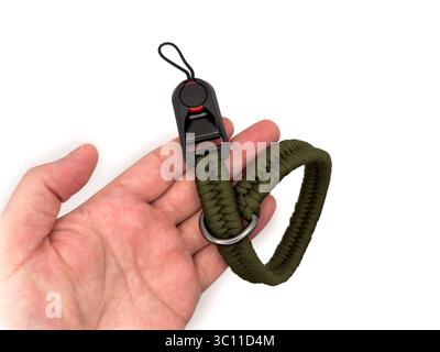 Cinturino verde per fotocamera a forma di corda su sfondo bianco. copia spazio, vista superiore, flay lay. Foto di alta qualità Foto Stock