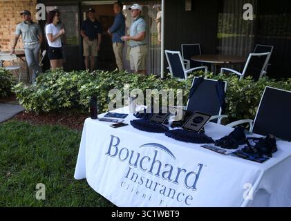 21 marzo 2019 - Palm Harbor, Florida, Stati Uniti - DIRK SHADD | Times.dipendenti Bouchard Insurance presso la suite di ospitalità del Valspar Championship, 36750 US Hwy. 19 nord, a Palm Harbor, giovedì 21 marzo 2019. Abbiamo preparato la sezione Top Workplaces per 10 anni. Dieci aziende hanno fatto la lista per tutti e dieci gli anni. Uno di loro e' la Bouchard Insurance. I loro dipendenti dicono che tra le cose che lo rendono un luogo ideale per lavorare ci sono i vari eventi della comunità a cui partecipano insieme ogni anno, tra cui gare di 10 km, ma anche il campionato Valspar per molti anni. (Immagine di credito: © D Foto Stock