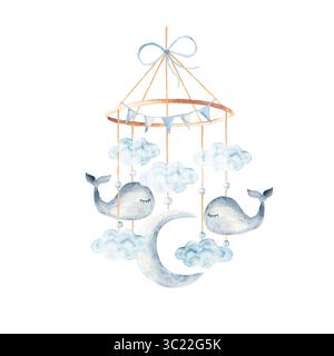 Culla per bambini ad acquerello mobile con graziose balene nelle nuvole. Illustrazione disegnata a mano nei colori blu pastello del giocattolo per bambini. Per biglietti d'auguri Foto Stock