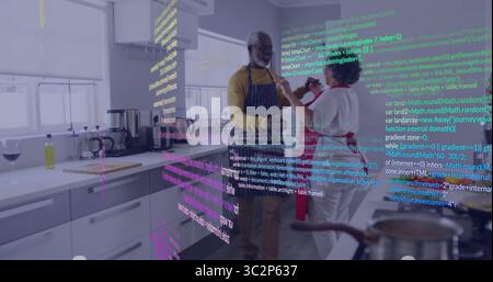 Danzare tenendosi per mano coppia che indossa grembiuli in cucina con lavandino e rubinetto, sovrapposizione codice. Famiglia, domestico, contemporaneo, salute, relax, stile di vita Foto Stock