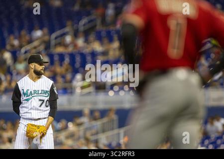 28 luglio 2019, Miami, FL, Stati Uniti: Il lanciatore dei Miami Marlins Nick Anderson (70) affronta problemi con le basi caricate nell'ottavo inning contro gli Arizona Diamondbacks domenica 28 luglio 2019 al Marlins Park di Miami, Flag. (Credit Image: © TNS via ZUMA Wire) Foto Stock
