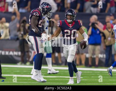7 ottobre 2018 - Houston, Texas, USA - il defensive back degli Houston Texans Justin Reid (20) celebra con il compagno di squadra il linebacker Peter Kalambayi (58) durante la partita NFL tra Dallas Cowboys e Houston Texans il 7 ottobre 2018 all'NRG Stadium di Houston, Texas. Gli Houston Texans sconfissero i Dallas Cowboys 19-16. Â©Maria Lysaker-ZUMA Press (immagine di credito: © Maria Lysaker/ZUMA Wire) Foto Stock