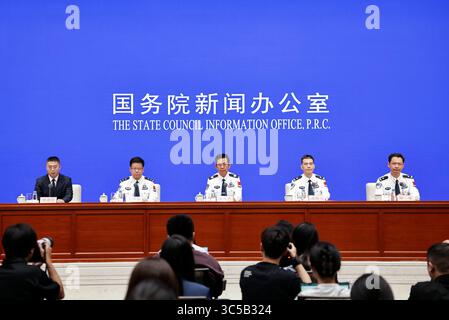 Pechino, Cina. 30 luglio 2025. Wang Zhizhong, vice ministro della sicurezza pubblica e capo dell'amministrazione nazionale per l'immigrazione, partecipa a una conferenza stampa tenuta dall'Ufficio informazioni del Consiglio di Stato (SCIO) sui risultati conseguiti dalla Cina nella gestione dell'immigrazione durante il quattordicesimo periodo del piano quinquennale (2021-2025) a Pechino, capitale della Cina, 30 luglio 2025. Crediti: Zhang Yuwei/Xinhua/Alamy Live News Foto Stock
