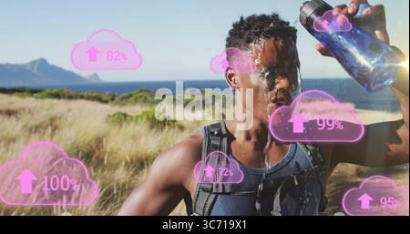 Runner in canotta che versa acqua dalla bottiglia d'acqua sulla costa con pacchetto idratante, icone rosa Foto Stock
