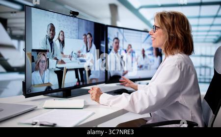 Riunione virtuale del team medico: Dentista, veterinario, infermiere collaborano online Foto Stock