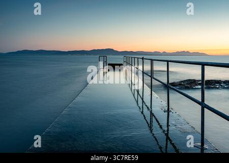 Tramonto sulla baia di Dundalk, Annagassan, Louth, Repubblica d'Irlanda Foto Stock