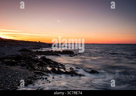 Tramonto sulla baia di Dundalk, Annagassan, Louth, Repubblica d'Irlanda Foto Stock