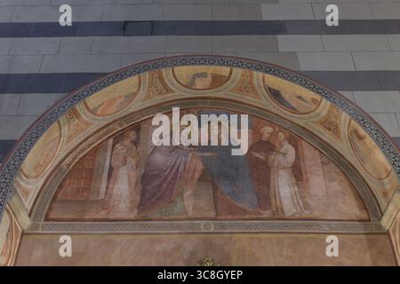 Visita e santi affresco, Scuola senese (c.1400-1425), nella Basilica di San Francesco (Basilica di San Francesco), Siena, Italia. Foto Stock