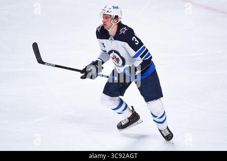 4 marzo 2021: Guardate il difensore dei Winnipeg Jets Tucker Poolman (3) durante la partita dei Winnipeg Jets contro i Montreal Canadiens al Bell Centre di Montreal, Quebec. David Kirouac/CSM(immagine di credito: &Copy; David Kirouac/CSM tramite cavo ZUMA) Foto Stock
