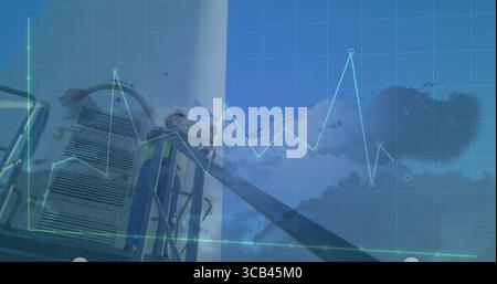 Il tecnico della turbina sale la scala sulla torre indossando il giubbotto con sovrapposizione dei dati digitali Foto Stock